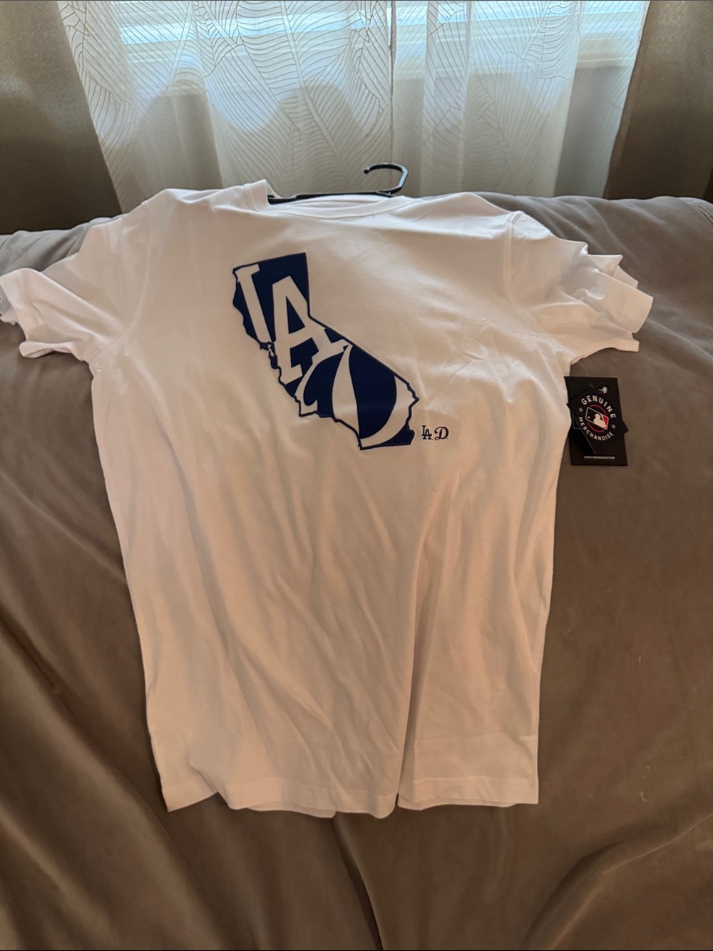 Genuine Merchandise White Short Sleeve Tee with Navy California Graphic